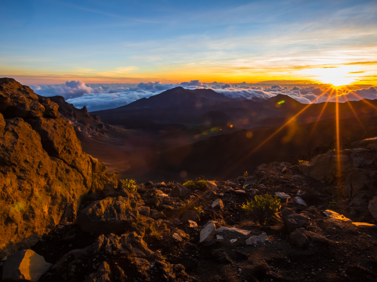 Sunsetting under the clouds at Haleakalā National Park, Maui Hawaii