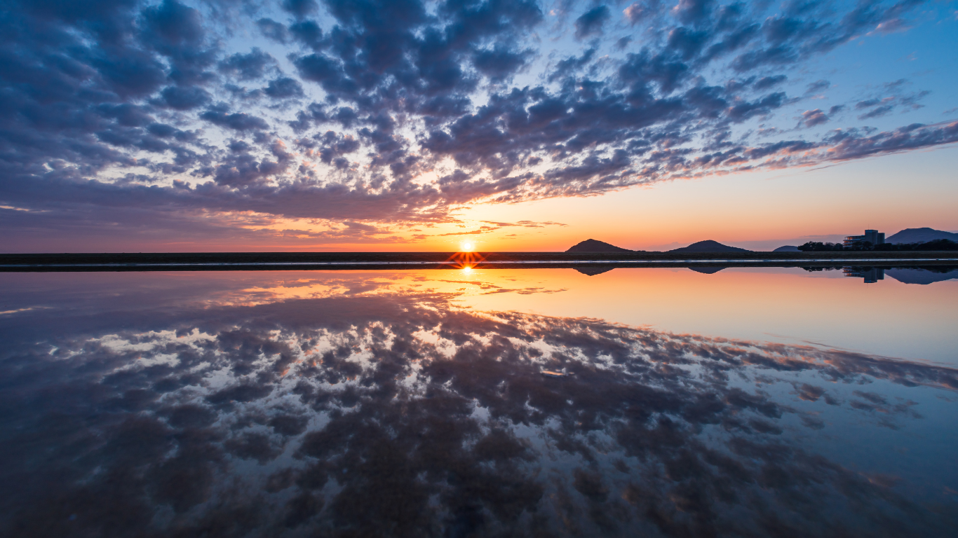 Chichibugahama Beach at sunset reflecting off the water: Shikoku