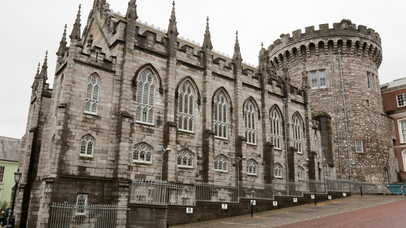 Dublin Castle looks like a church basilica and gothic looking castle made from brick and mortar 