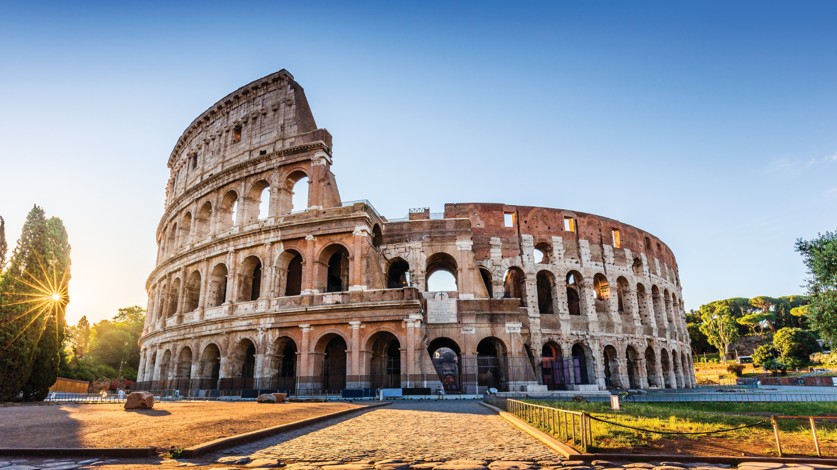 The Colosseum in Rome in the summer time with no tourist in the scene