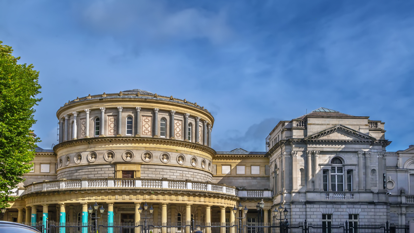 The national Museums in Dublin is a pretty building with rounded roof on top of an old castle looking building. 