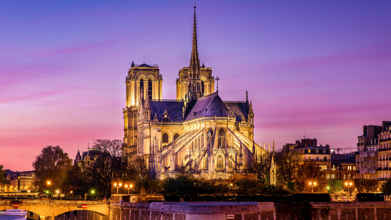 Notre-Dame Cathedral at night with clear skies