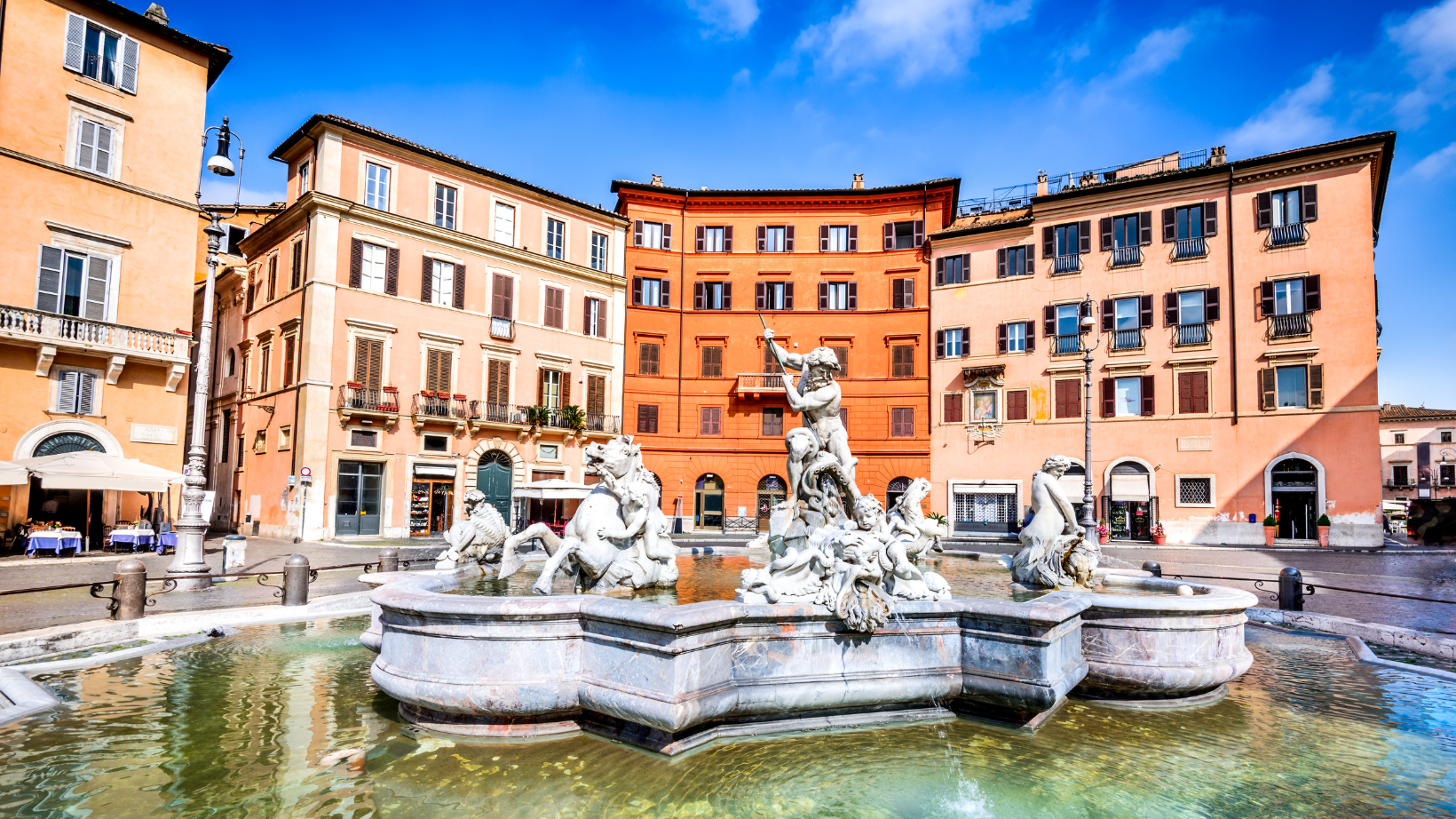 Piazza Navona statues  in Rome with clear skies