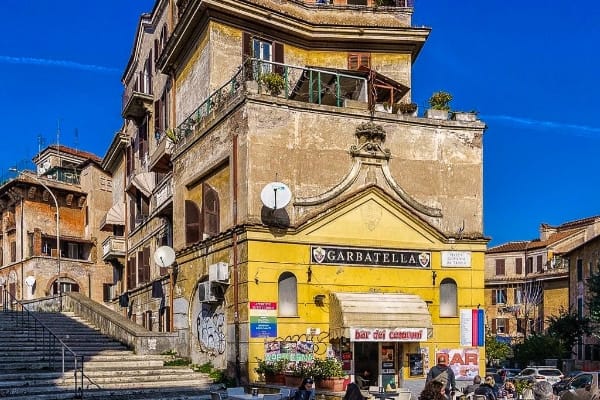 shop in the front of building Garbatella neighborhood of Rome