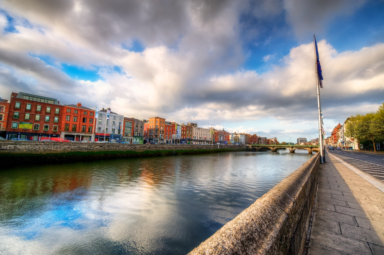 River Liffey walkway near the river with Dublin's buildings 