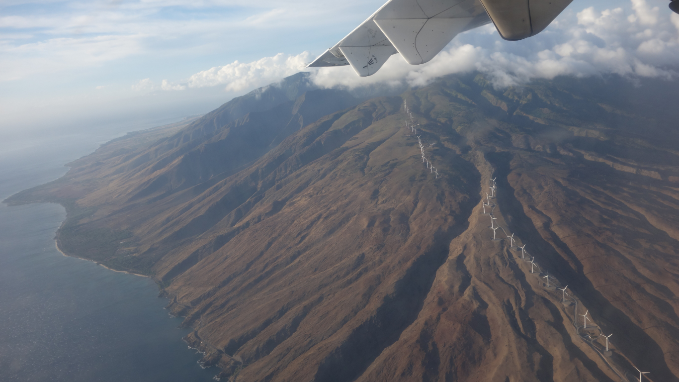 Ariel view of Windmills Lookout which shows tons of windmills on top of a mountain in Maui