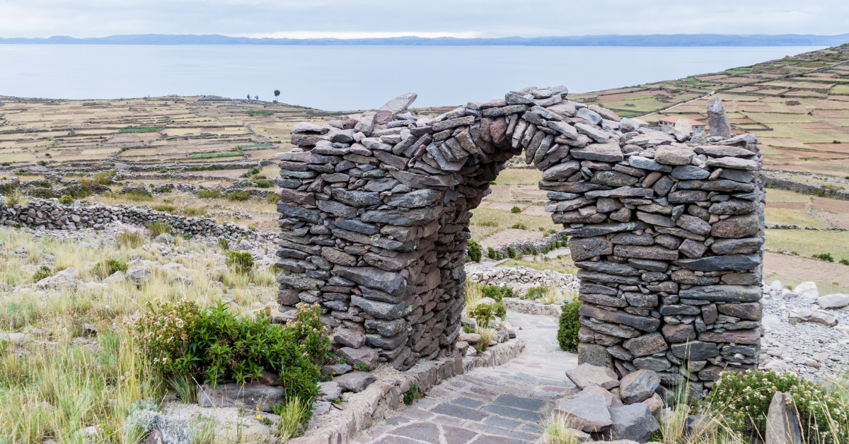 rocks stacked into an arch at Centro Ceremonial Pachatata - Lake Titicaca travel guide