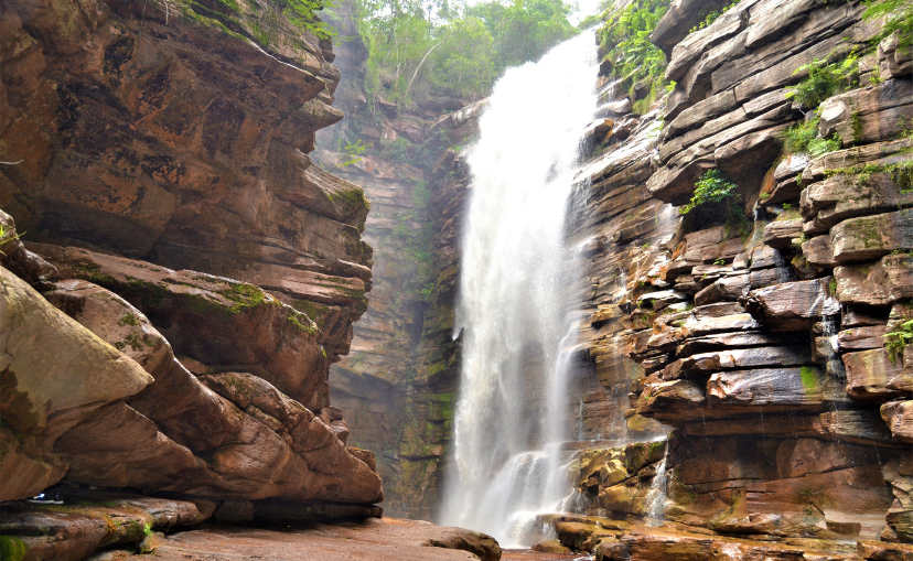 the most beatiful water fall i've ver seen because there is a narrow canyon leading up to it and the rocks of these cliffs look like the thin rocks that some fireplaces are made from giving it a very unique aesthetic from other waterfalls.