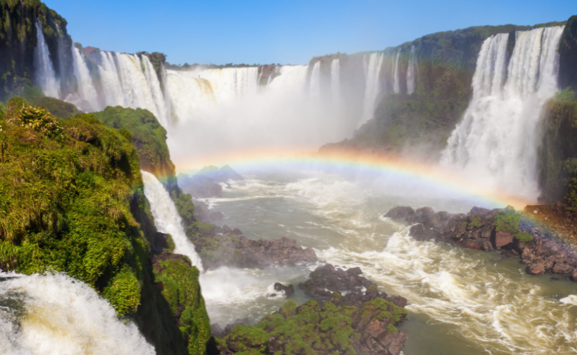 horseshoe waterfall with a rainbow in the mist at Iguazu Falls