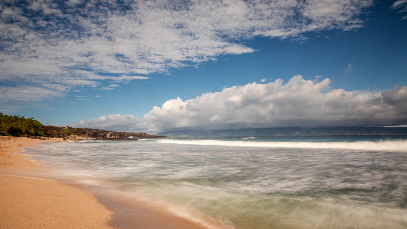 waves washing ashore on Ironwoods Beach in Maui