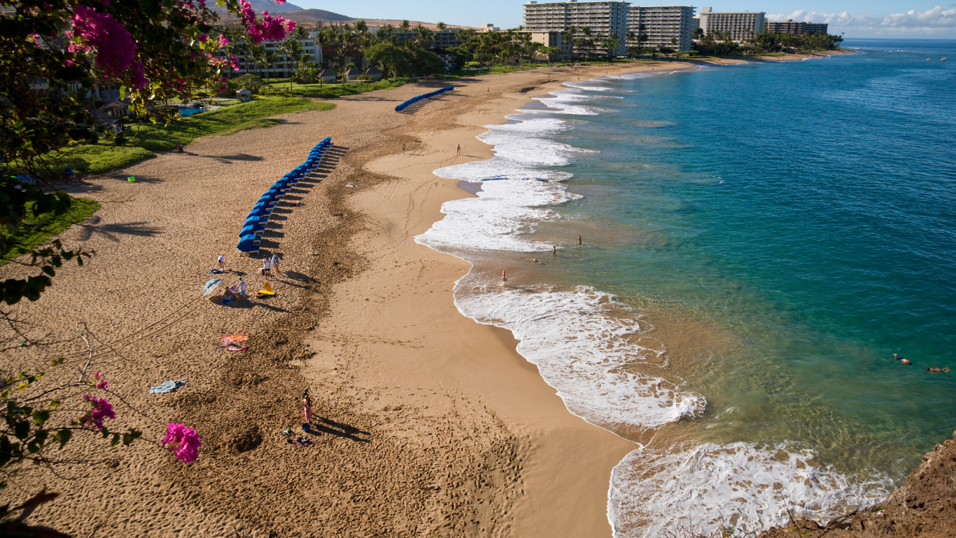 Kaanapali Beach with waves washing to shore and resorts in the background