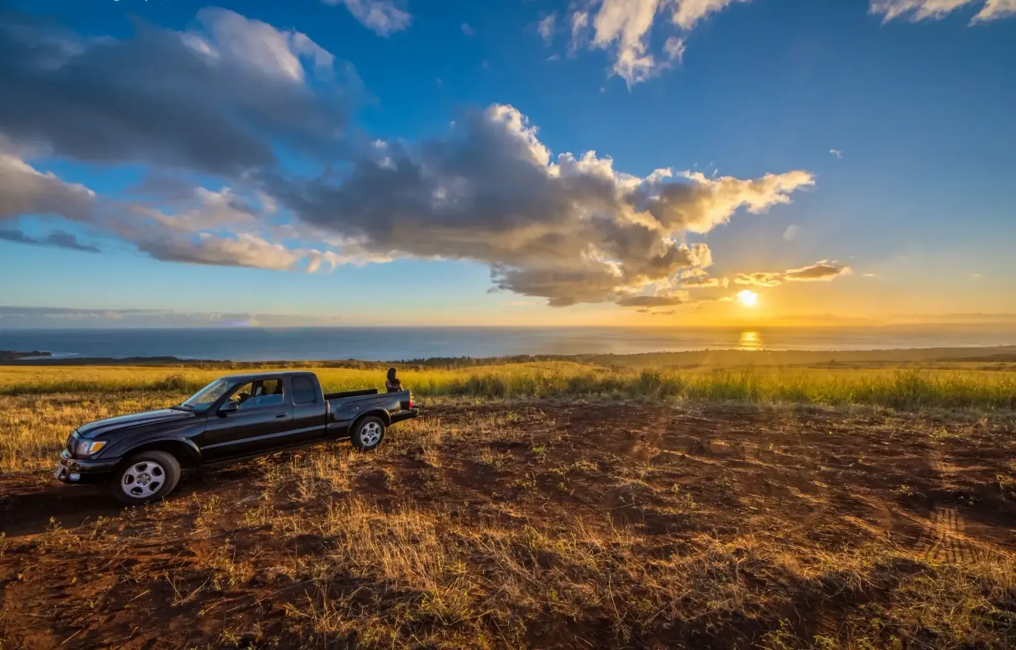 Lookout in Kekaha, Kauai at sunset overlooking the ocean.