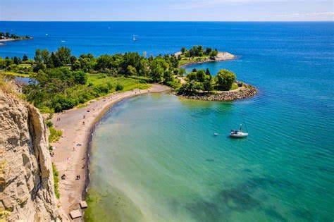 Beautiful beach that's water looks like the Caribbean Sea with clear blue waters and surrounded by a large cliff at  Bluffers Park Beach (Toronto, Ontario)