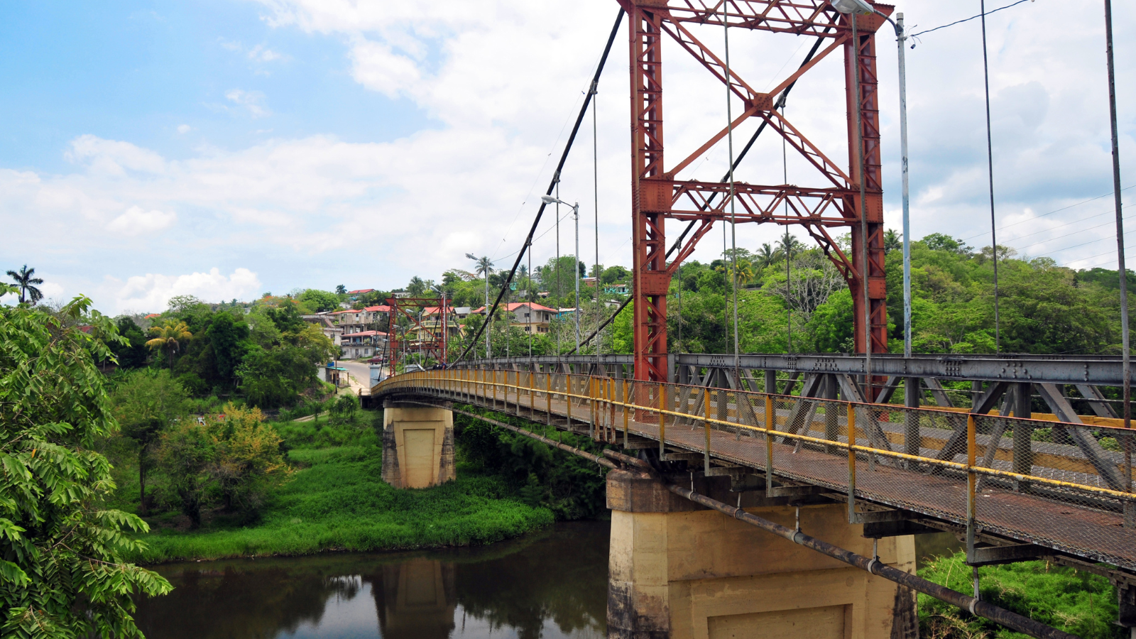 A bridge crossing a river in the town of San Ignacio, Belize