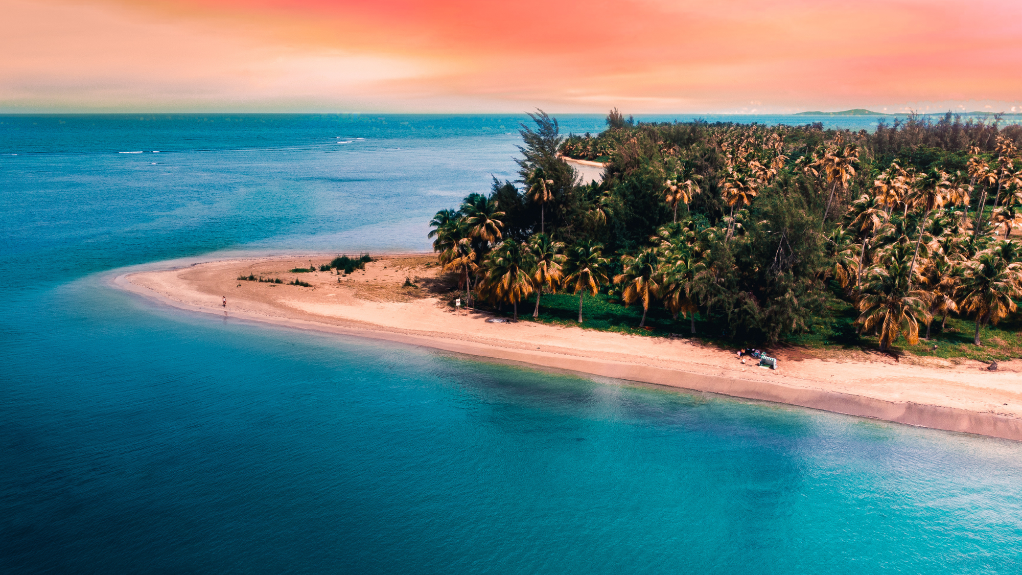 The pristine Seven Seas Beach in Puerto Rico is one of the most beautiful beaches with calm swimming areas and white sand surrounded by palm trees. 