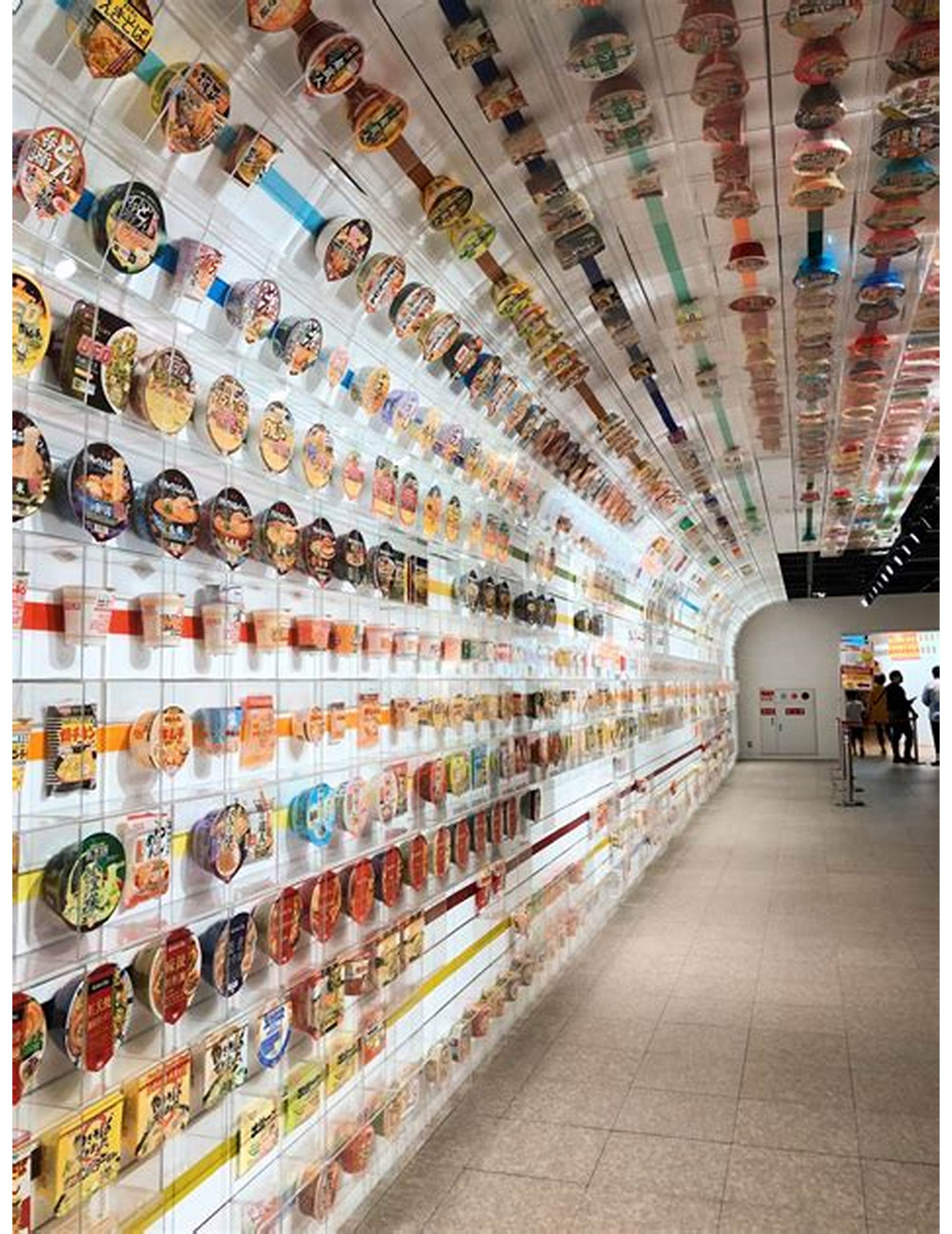 A wall lined with every type of instant cup of noodles ever created in Tokyo's Cup Of Noodles Museum.