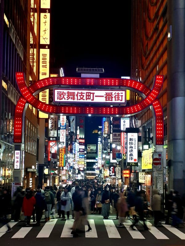 people walking the streets in Kabukicho, Tokyo's entertainment district