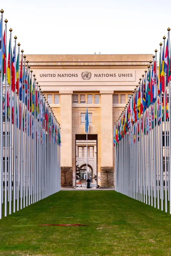 A bunch of flags in a row at the entrance to the United Nations in Geneva, Switzerland.