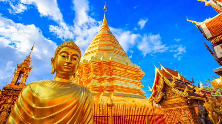 Wat Phra That Doi is a Golden temple complex, and there's a large golden Buddha statue.  